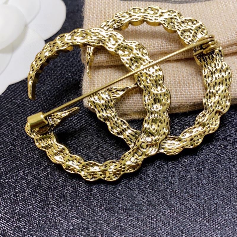 Gvc*1 brooches